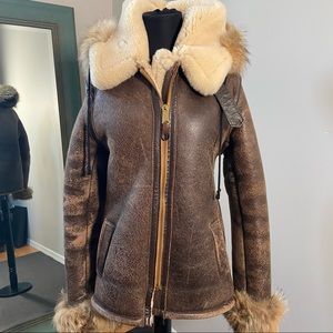 Shearling, distressed leather and fox trimmed jacket